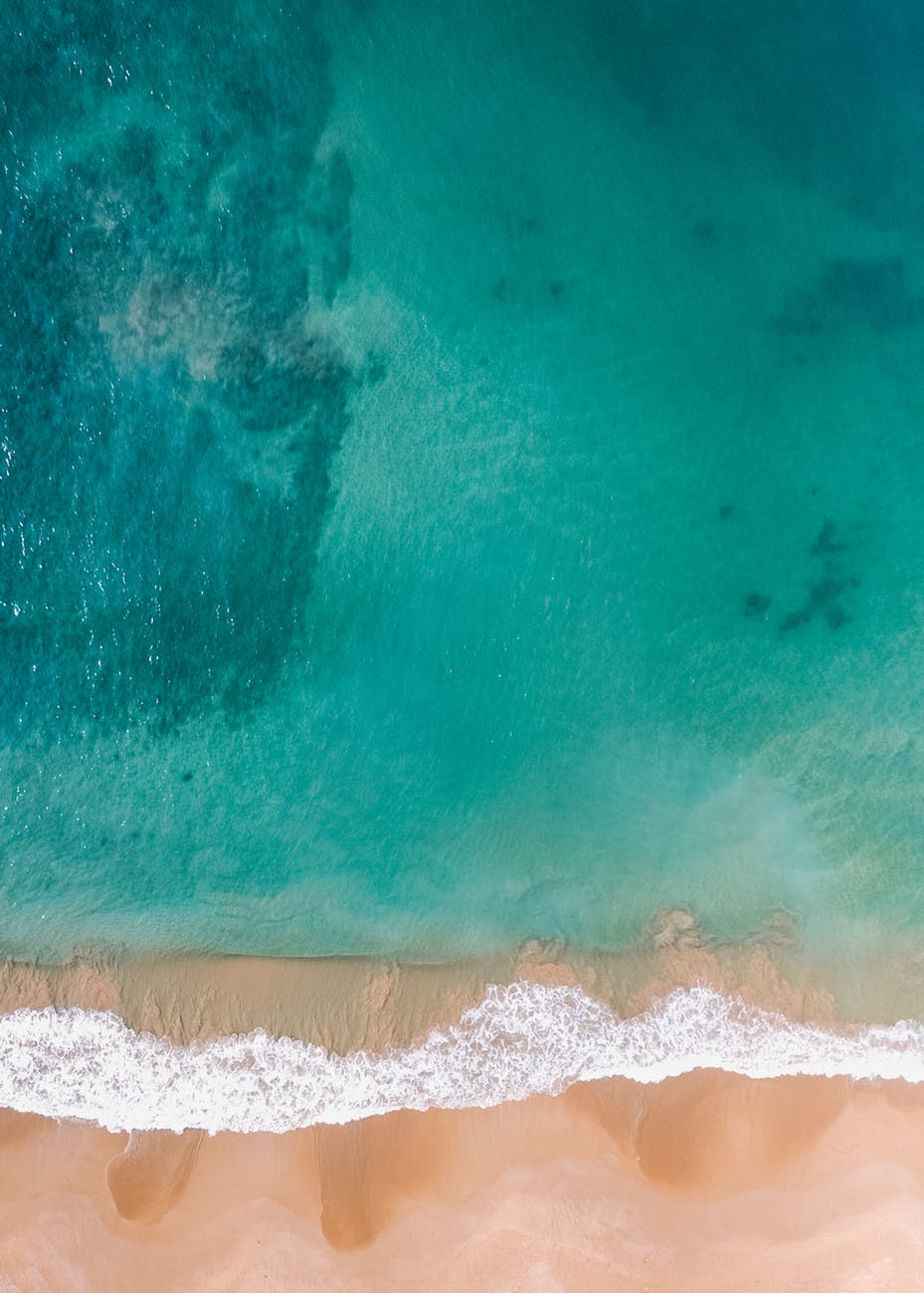 Stock image aerial shot beach blue water ocean gold sand